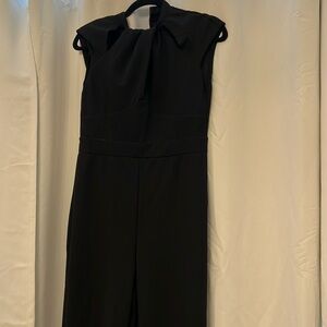 Black jumpsuit with keyhole cutouts. Great condition. Fits amazing.